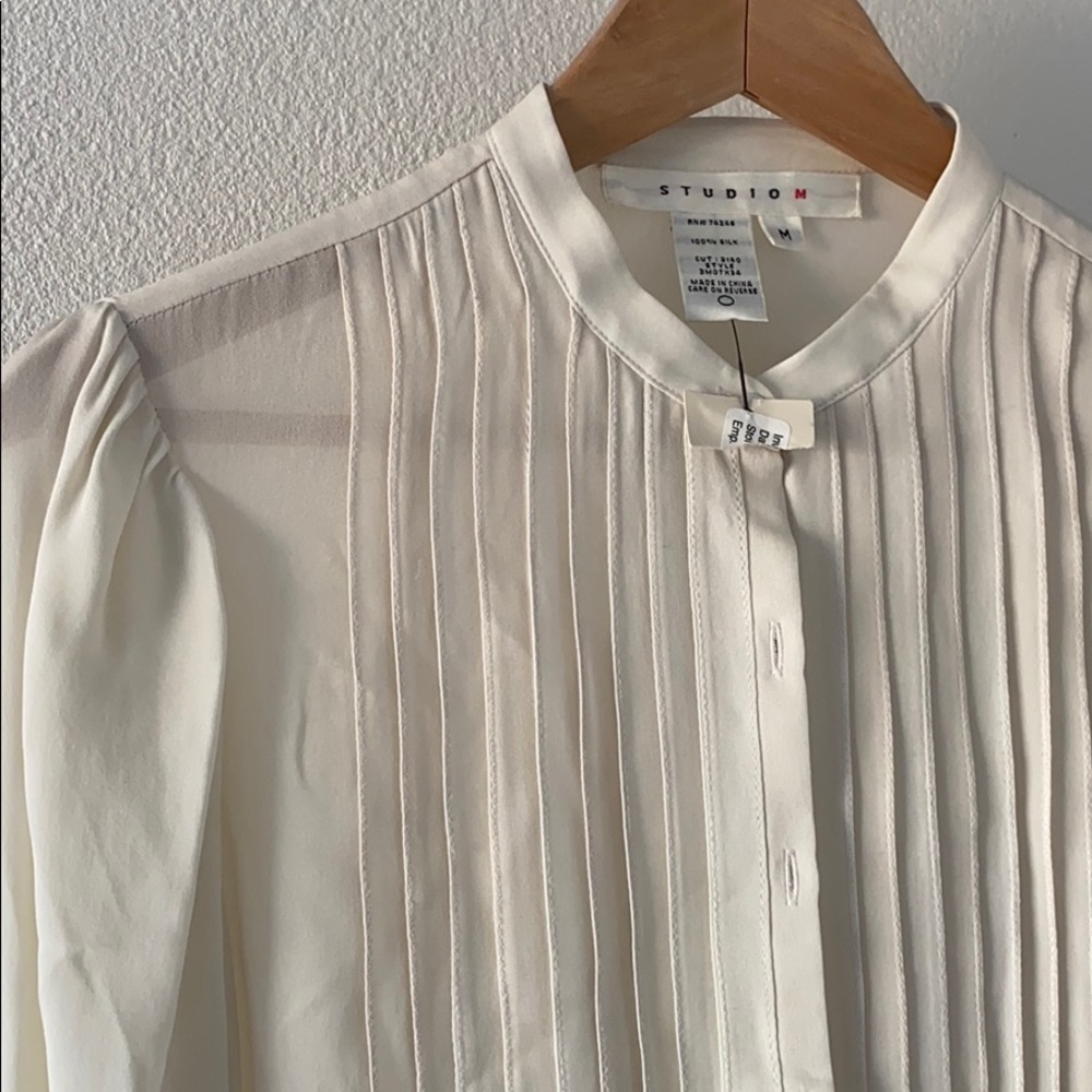 cream silk blouse